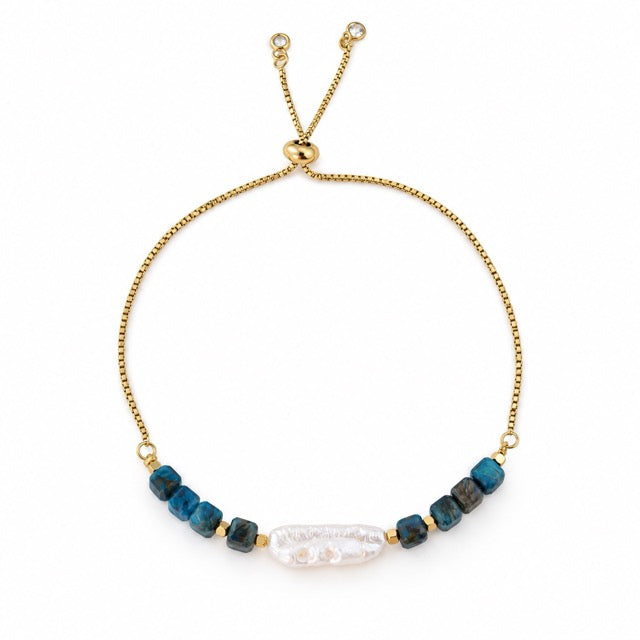 Pulsera AILA · Perla Barroca y Ojo de Tigre Azul