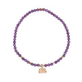  Pulsera de circonita morada con elefante dorado