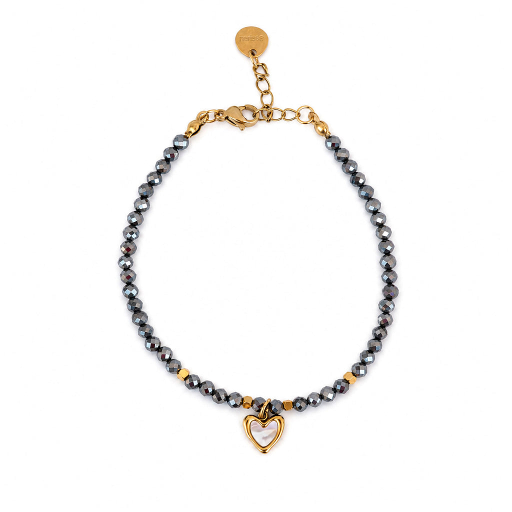 Pulsera de hematita con corazón de nácar de ANAIA Jewels sobre fondo blanco