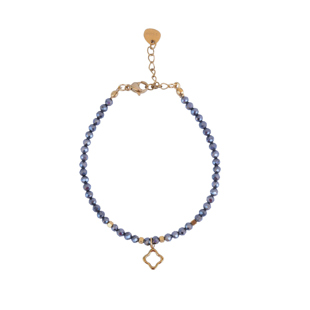 Pulsera de hematita natural con charm de trébol de nácar y acero inoxidable.