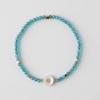 Pulsera de Circonitas con charm de nácar